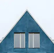 Blue triangular house top with two rectangular windows on a white background.